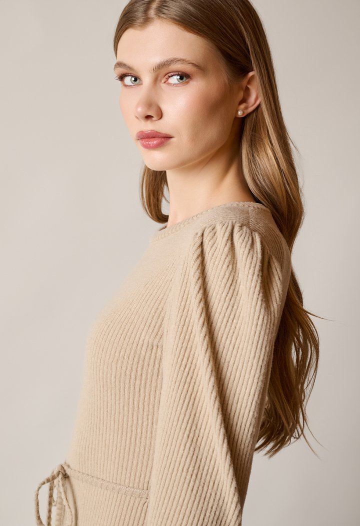 Knit dress with a belt at the waist