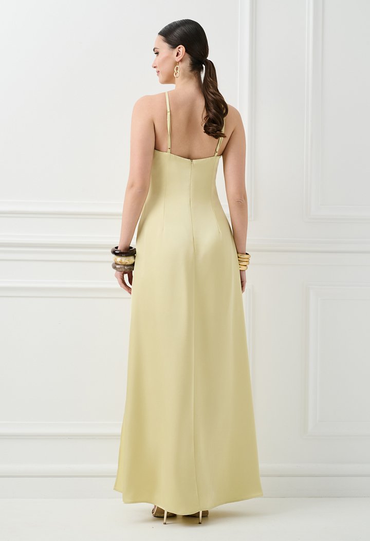 Maxi dress with a flower detail on the neckline