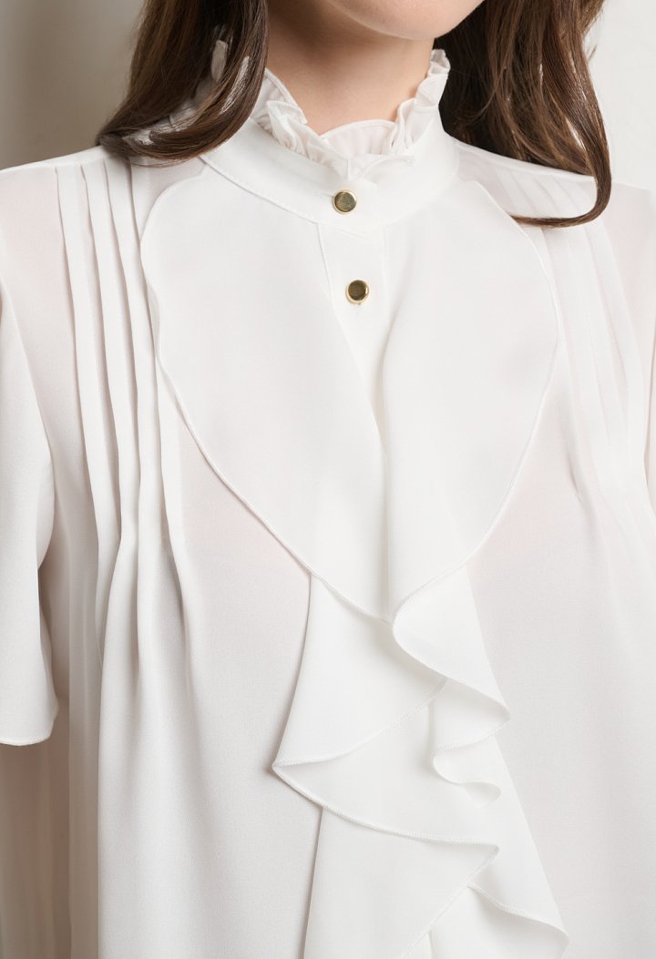 Blouse with ruffle detail and short sleeves