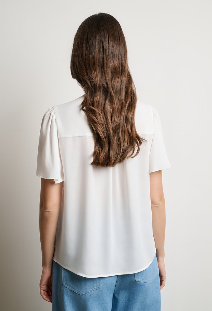 Blouse with ruffle detail and short sleeves