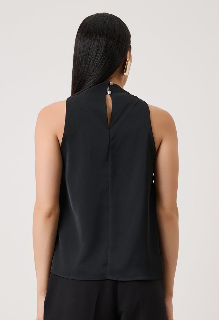 Sleeveless blouse with asymmetric draped neckline