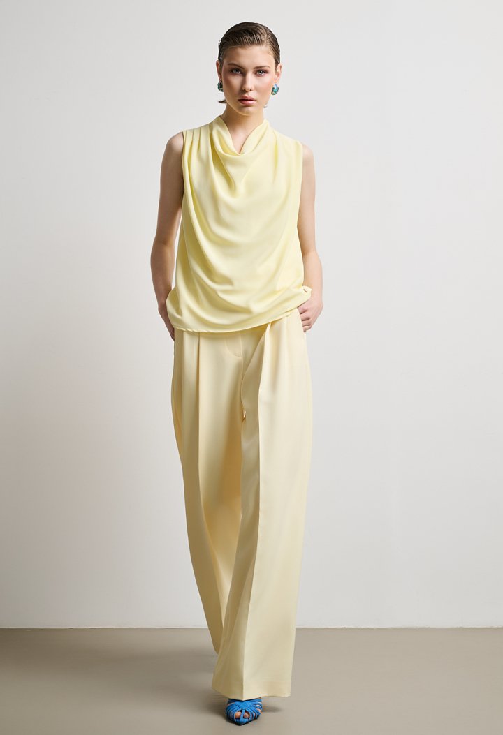 Blouse with draped neckline