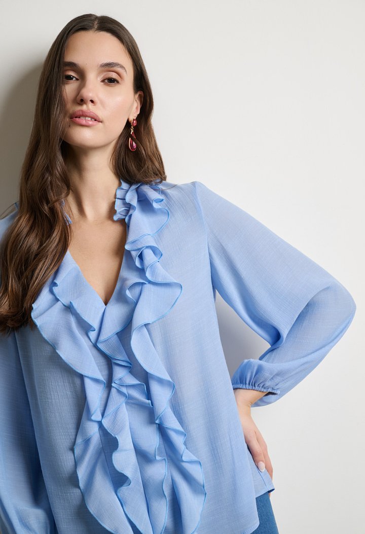 Blouse with ruffles and a V-neckline