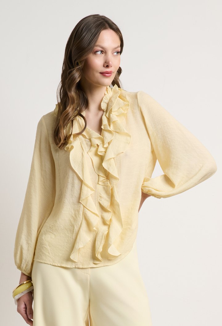 Blouse with ruffles and a V-neckline
