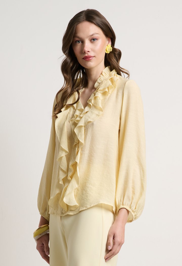 Blouse with ruffles and a V-neckline