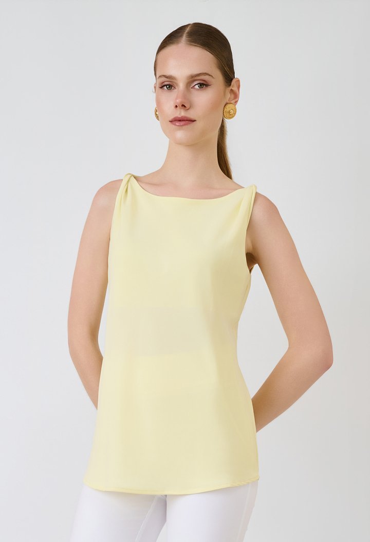 Sleeveless top with a round neckline