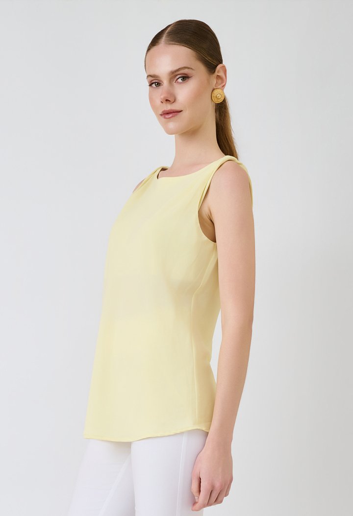 Sleeveless top with a round neckline
