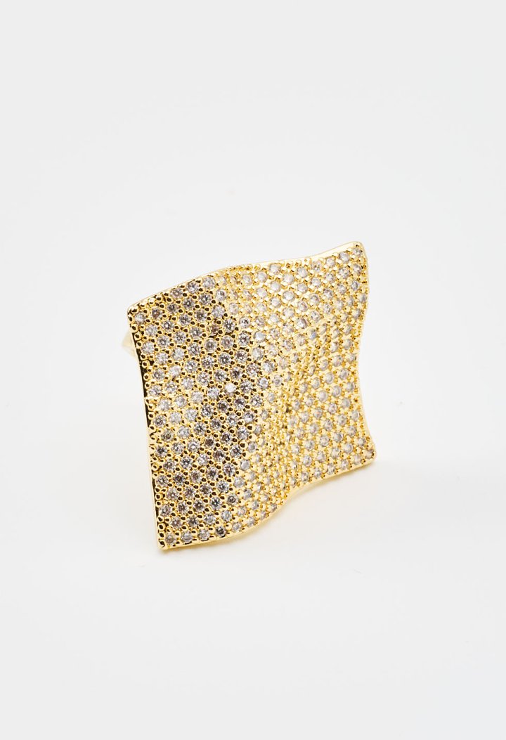 Ring with an asymmetrical geometric design and rhinestones