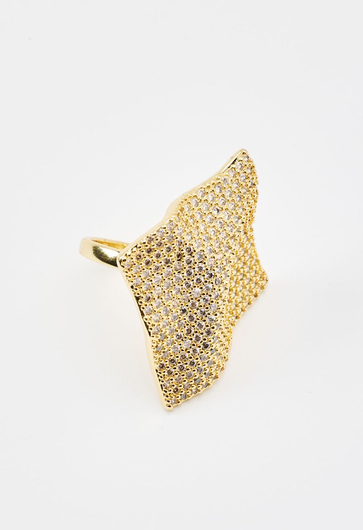 Ring with an asymmetrical geometric design and rhinestones