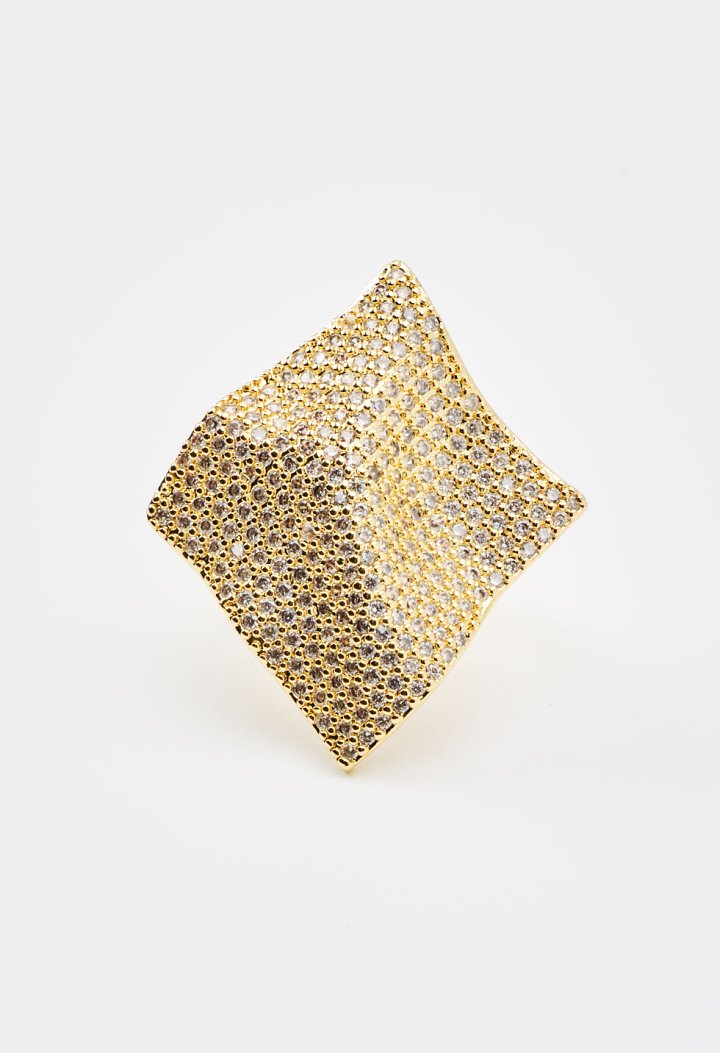Ring with an asymmetrical geometric design and rhinestones
