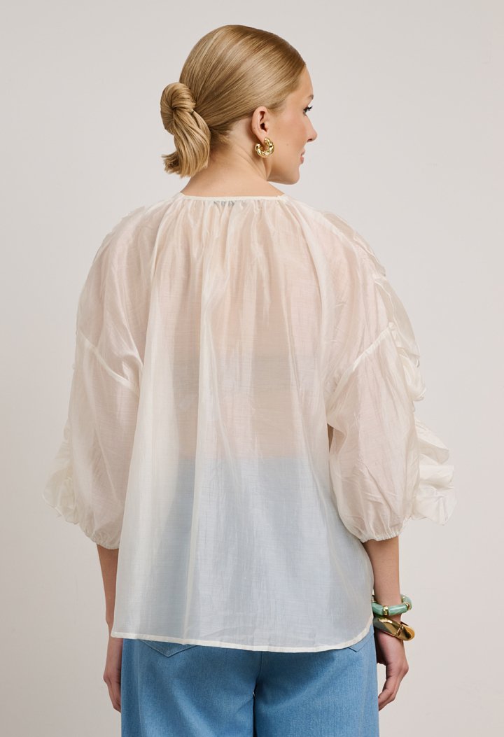 Blouse with ruffles and front buttons