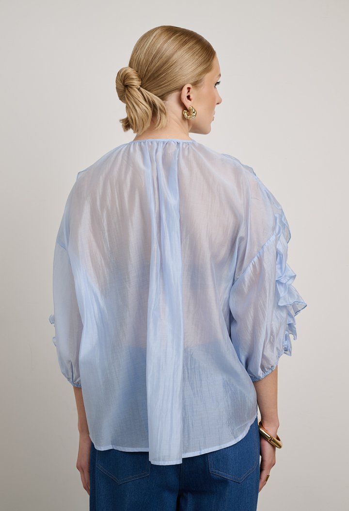 Blouse with ruffles and front buttons