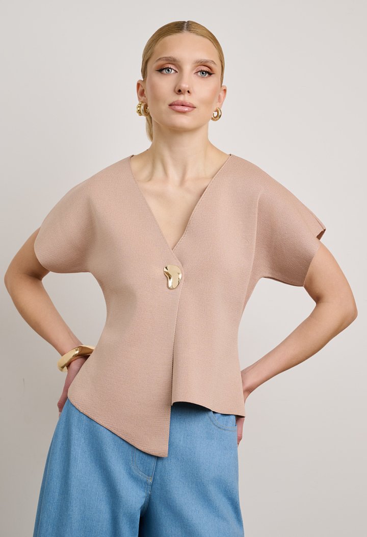 Knit cardigan with decorative fastening