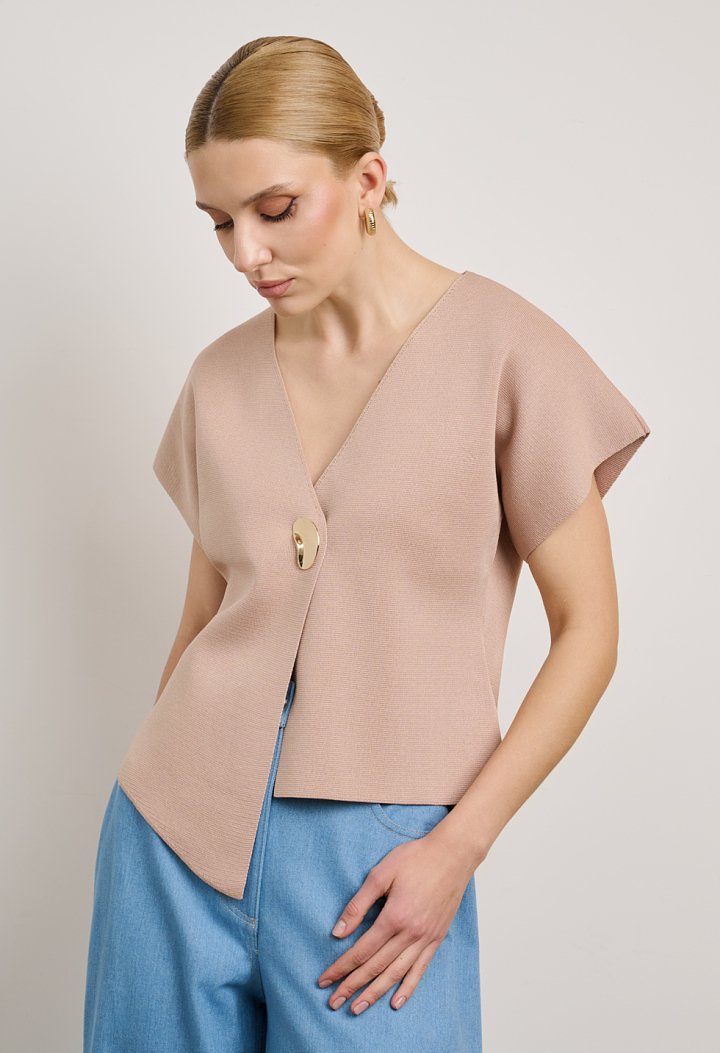 Knit cardigan with decorative fastening
