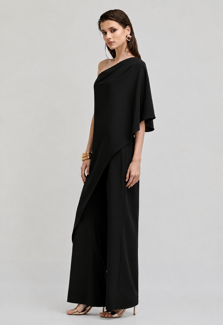 Βραδινό jumpsuit με ασύμμετρη κάπα
