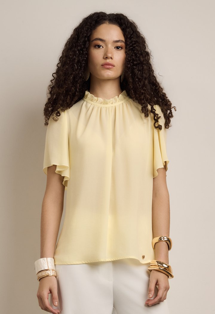 Blouse with ruffles and short sleeves