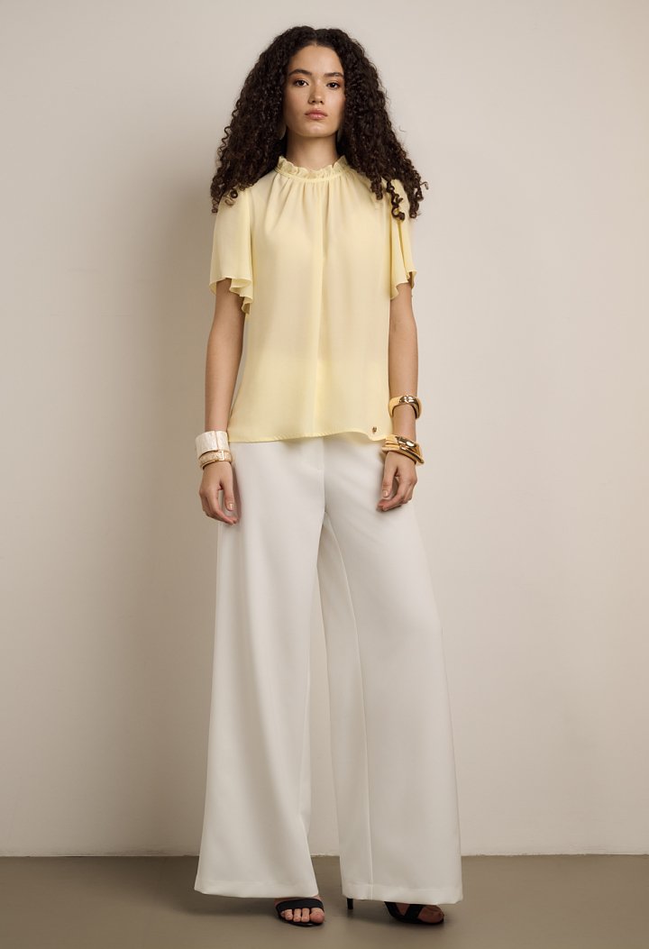Blouse with ruffles and short sleeves