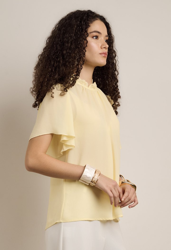Blouse with ruffles and short sleeves