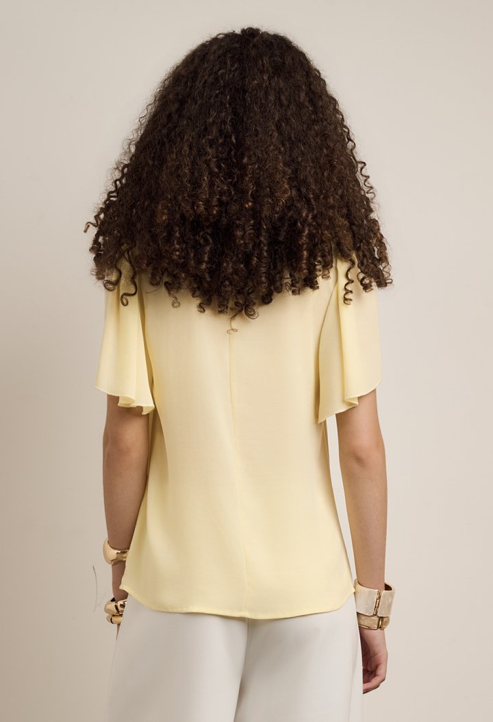 Blouse with ruffles and short sleeves