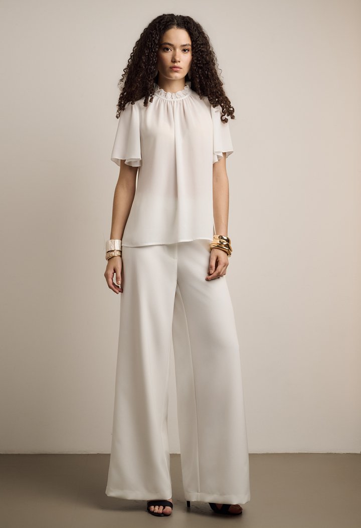 Blouse with ruffles and short sleeves