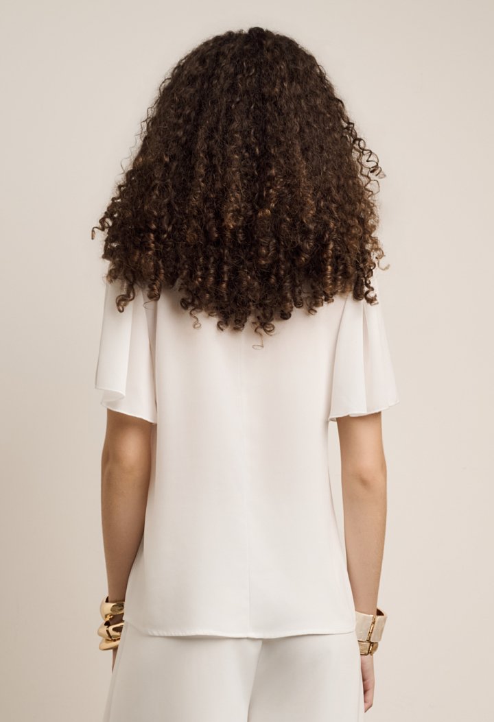 Blouse with ruffles and short sleeves