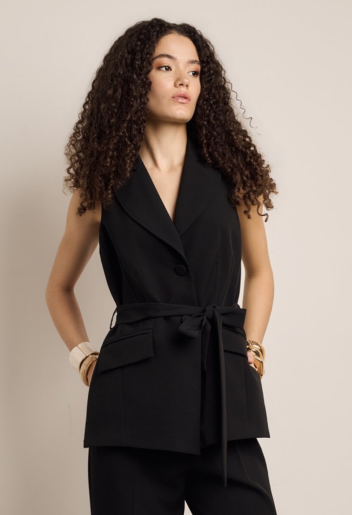 Sleeveless jumpsuit with front buttons and belt