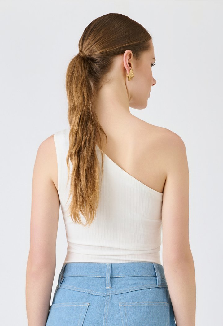 Asymmetric bodysuit with a metallic detail