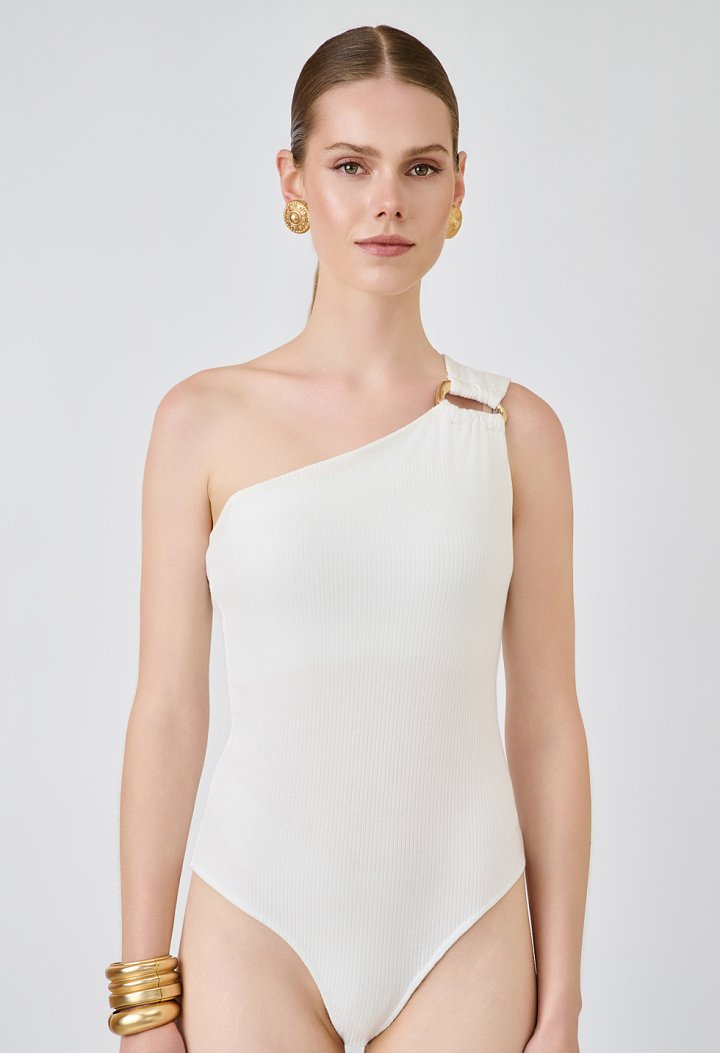 Asymmetric bodysuit with a metallic detail