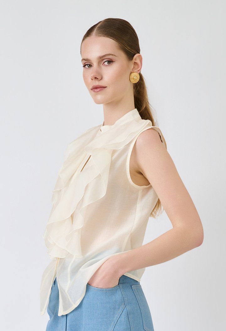 Sleeveless shirt with ruffles