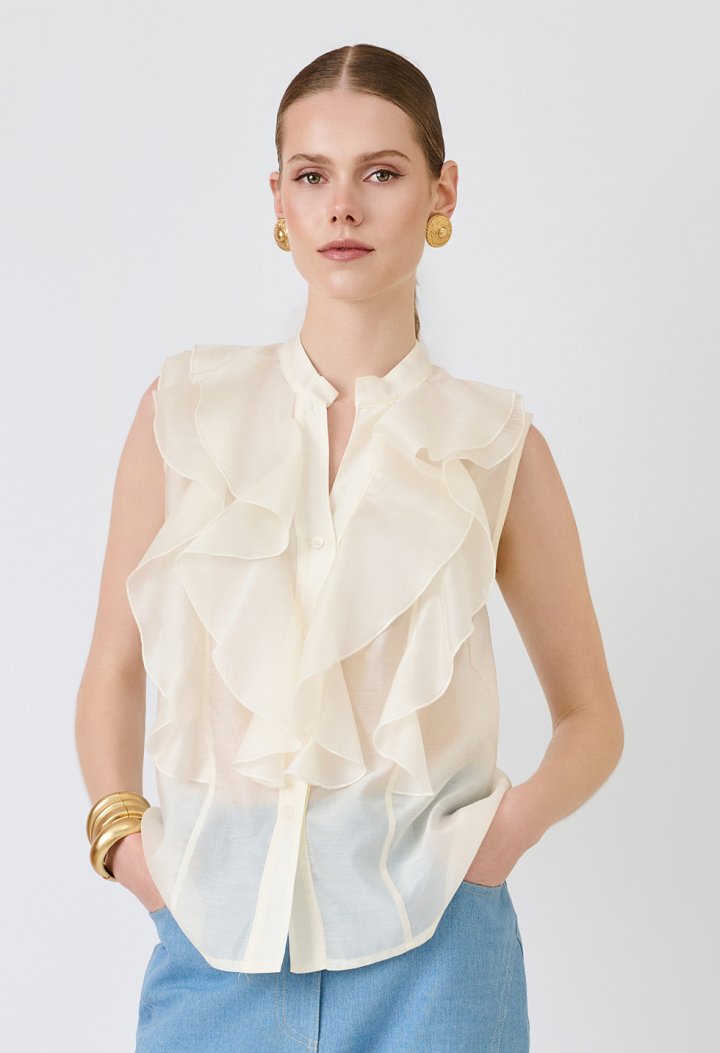 Sleeveless shirt with ruffles