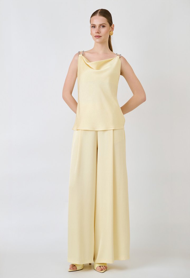 Strappy top with decorative pearls