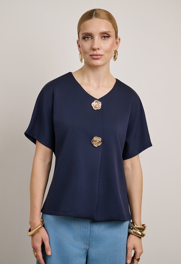 Blouse with a V-neckline and gold buttons