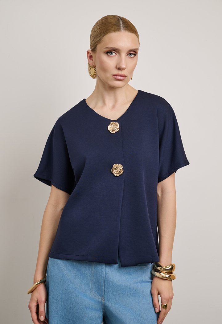 Blouse with a V-neckline and gold buttons