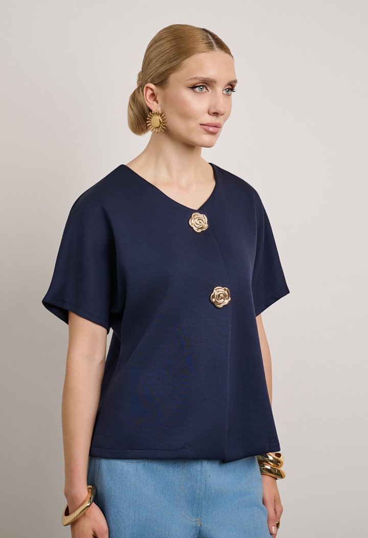 Blouse with a V-neckline and gold buttons