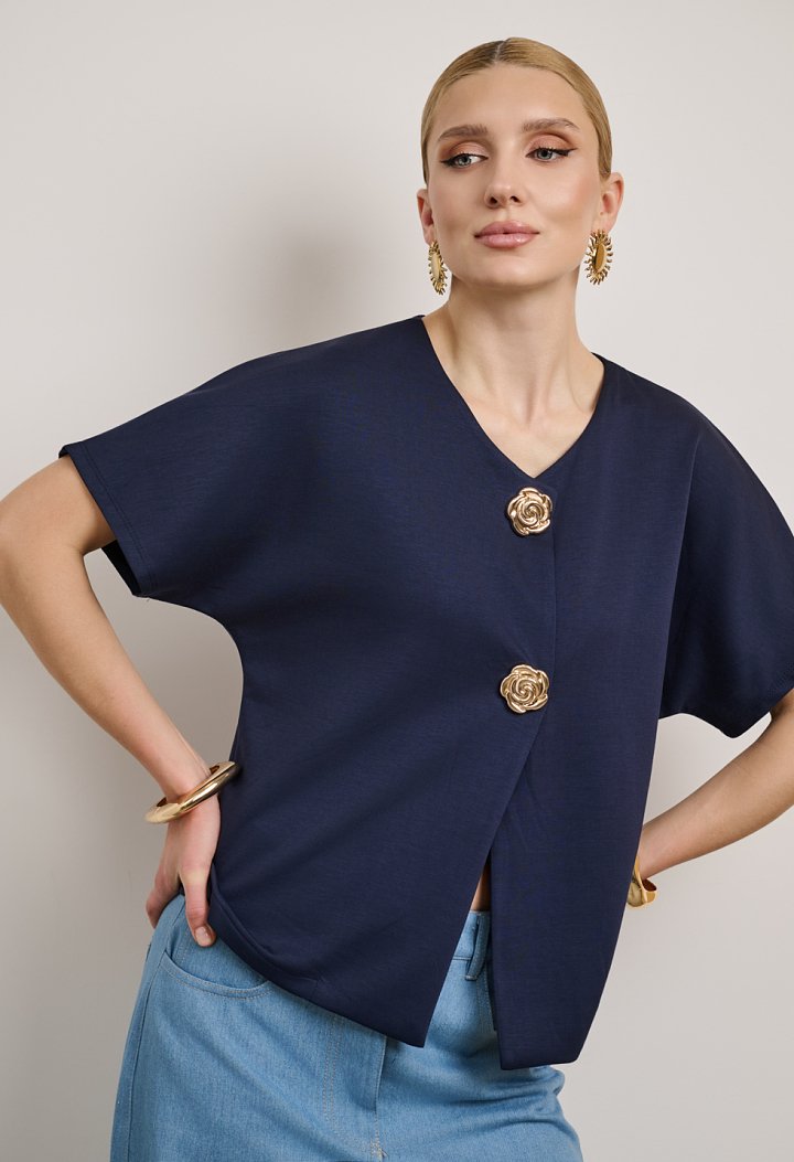 Blouse with a V-neckline and gold buttons