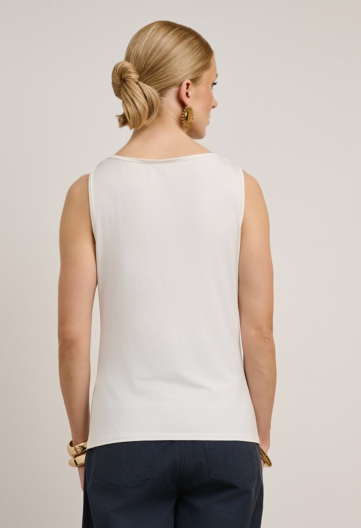 Sleeveless draped top with metallic details