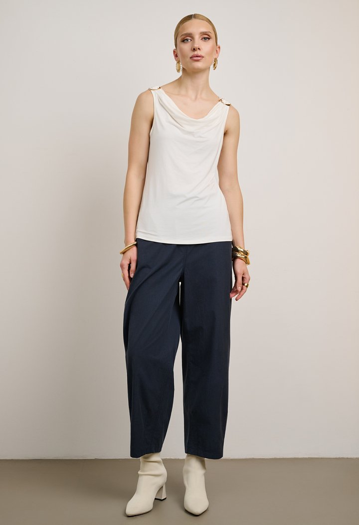 Sleeveless draped top with metallic details