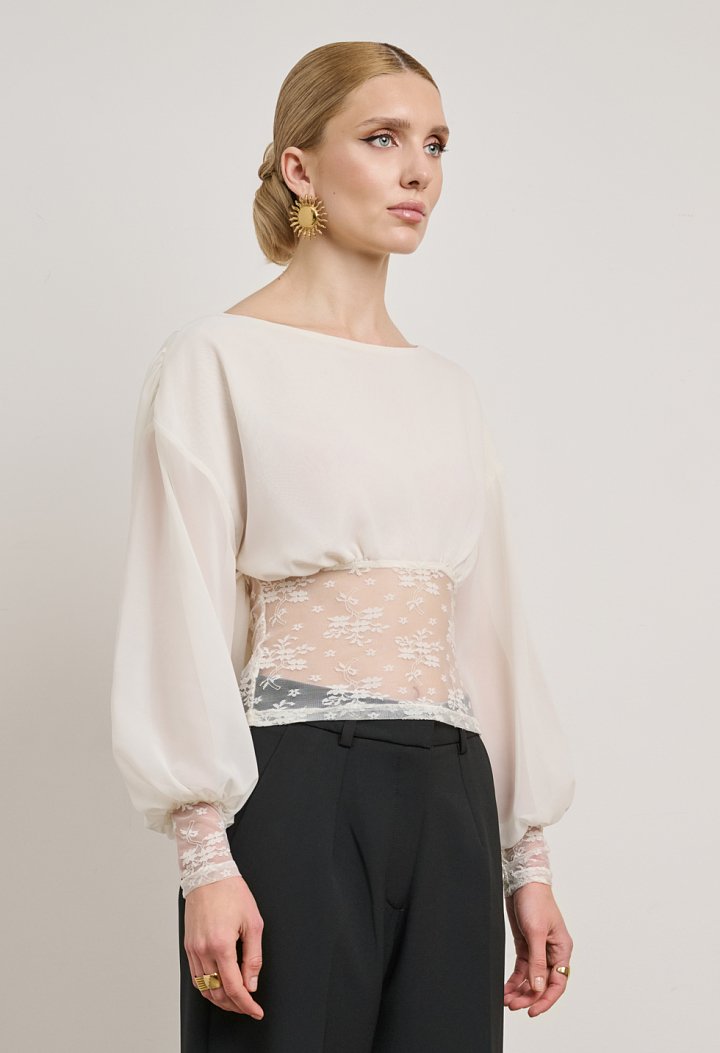Lace blouse with a sheer back