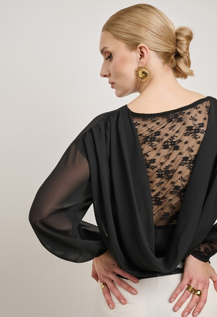 Lace blouse with a sheer back