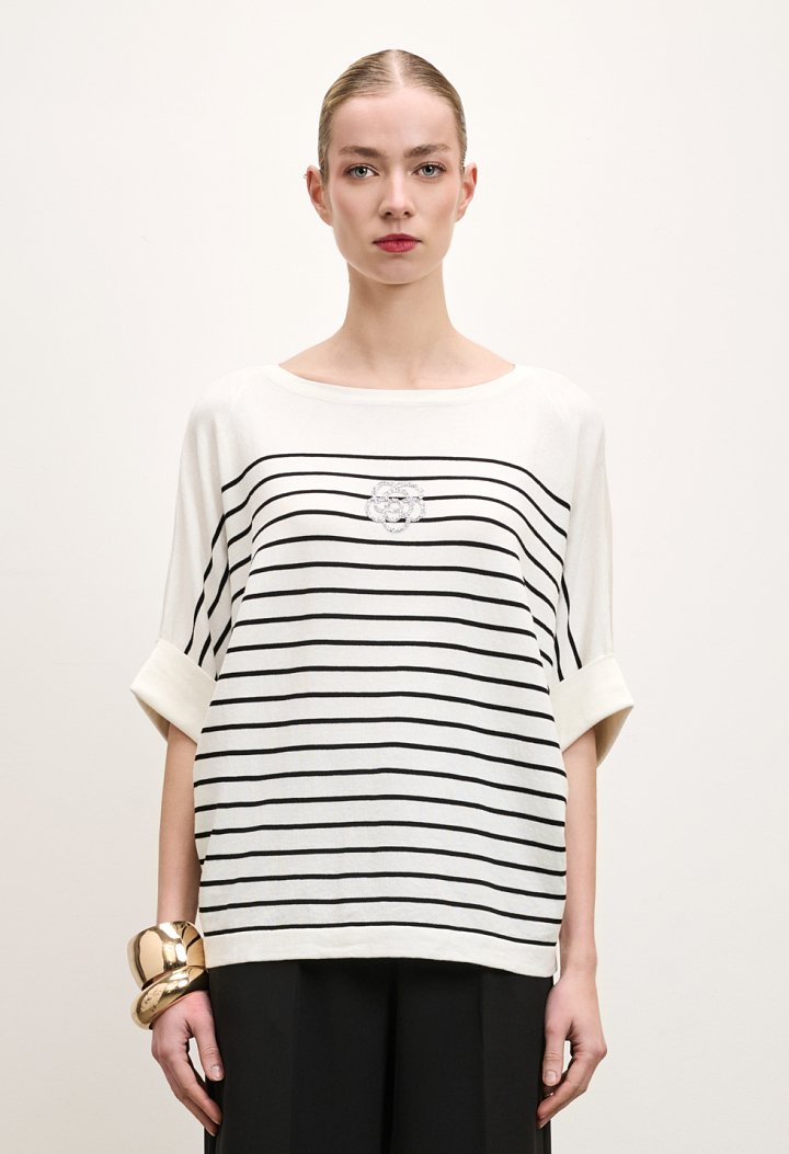 Striped blouse with a rhinestone flower design
