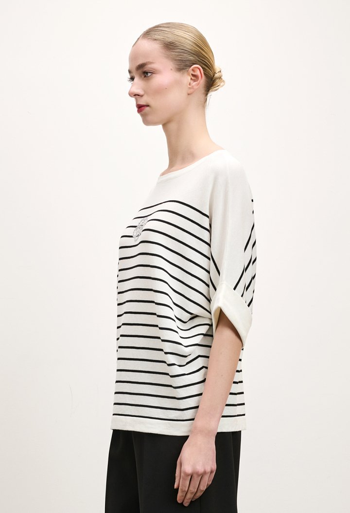 Striped blouse with a rhinestone flower design