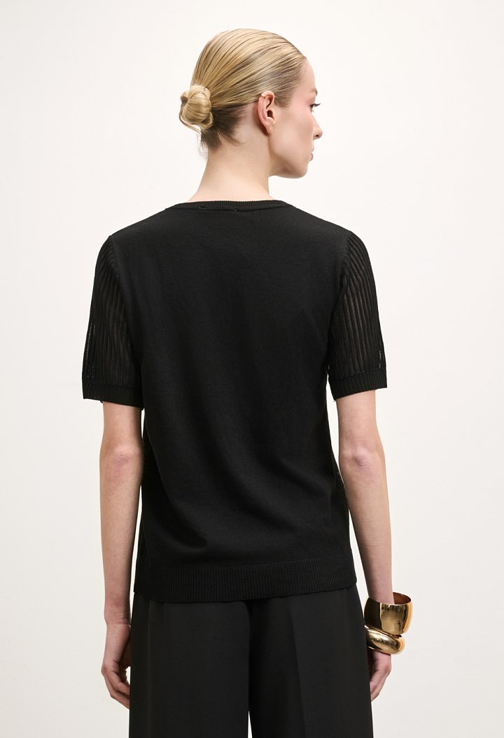 Knit top with sheer sleeves