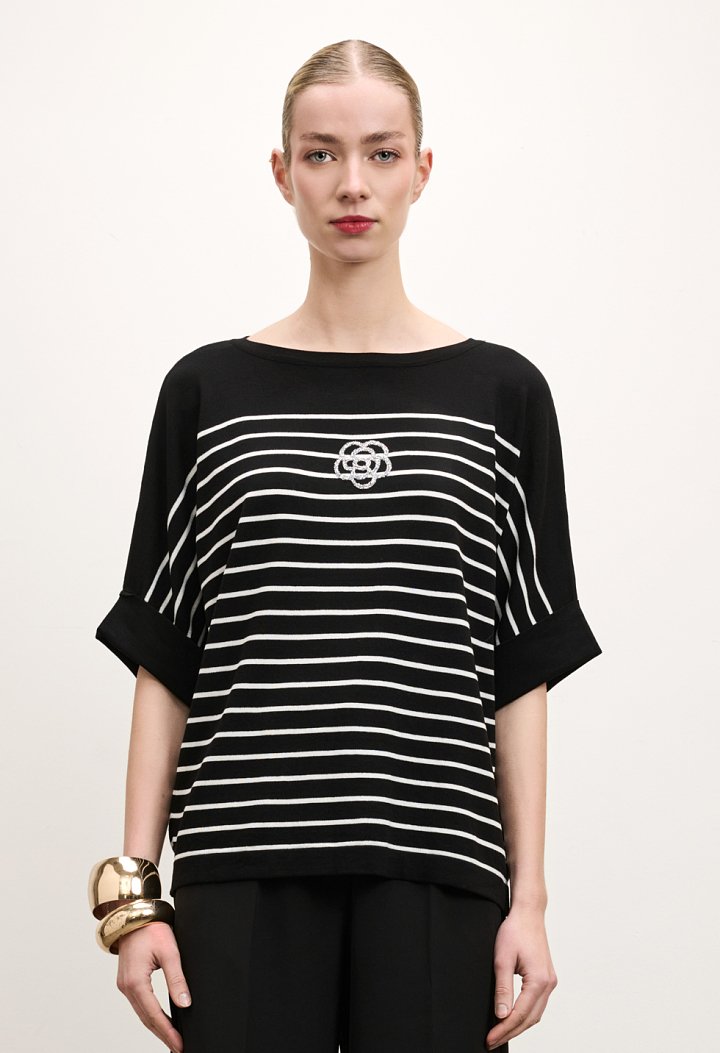 Striped blouse with a rhinestone flower design