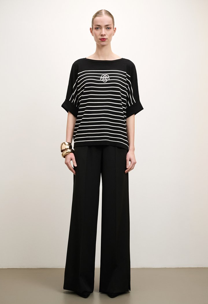 Striped blouse with a rhinestone flower design