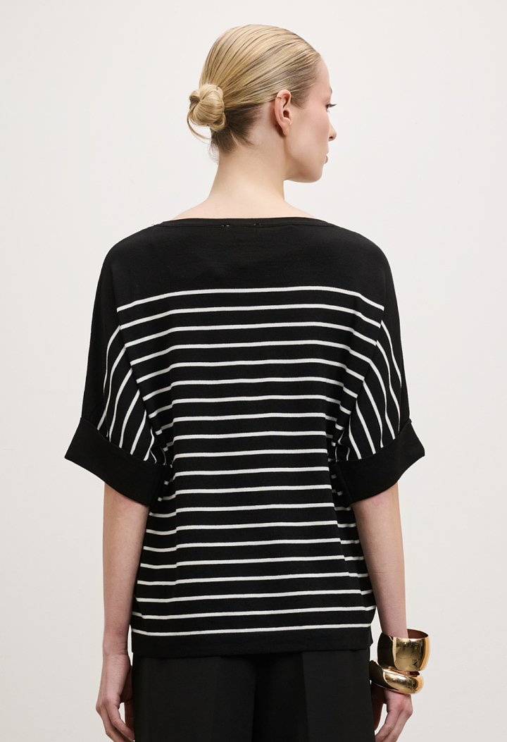 Striped blouse with a rhinestone flower design