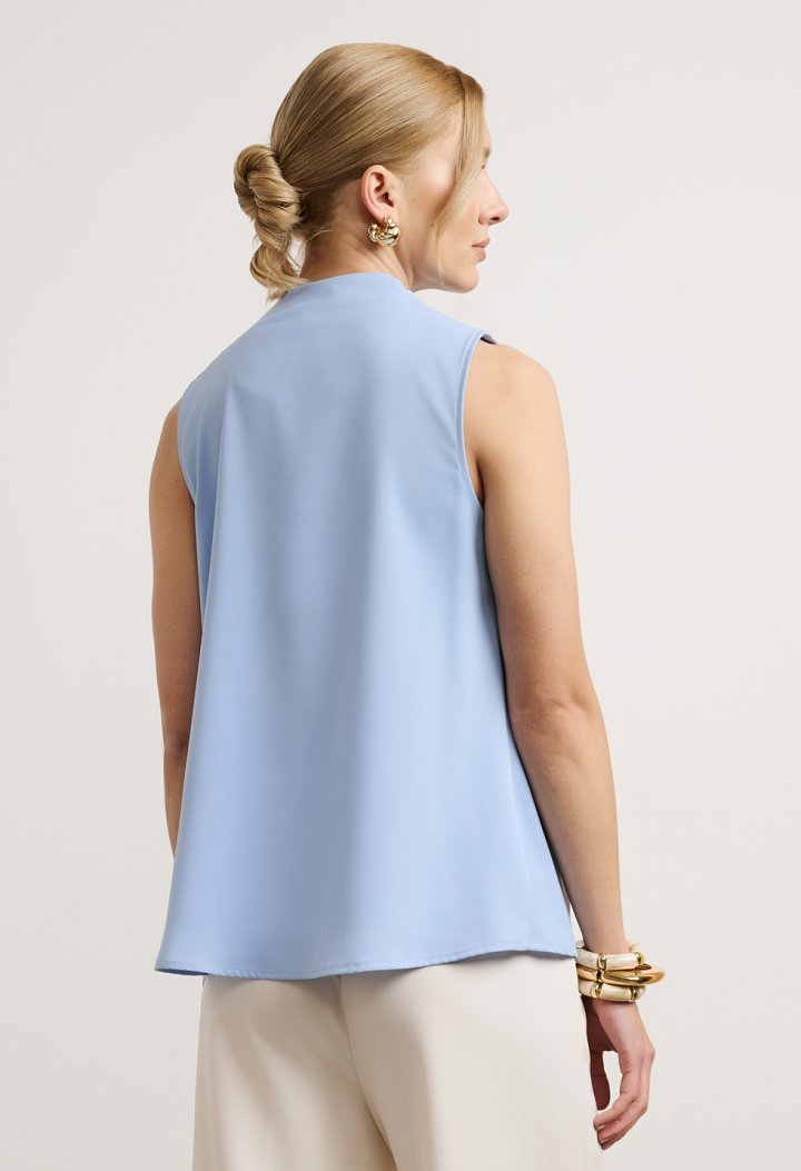 Blouse with draped neckline