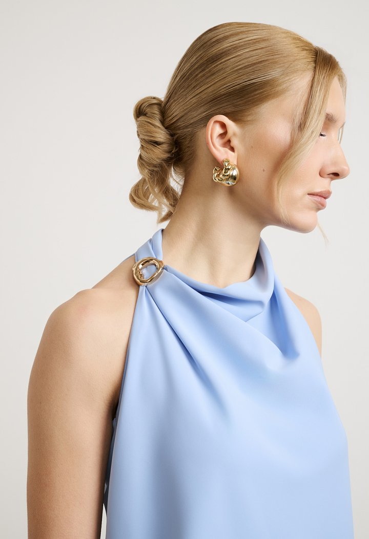 Halter blouse with decorative ring