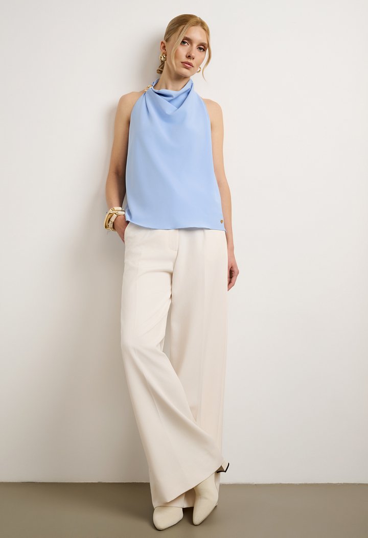 Halter blouse with decorative ring