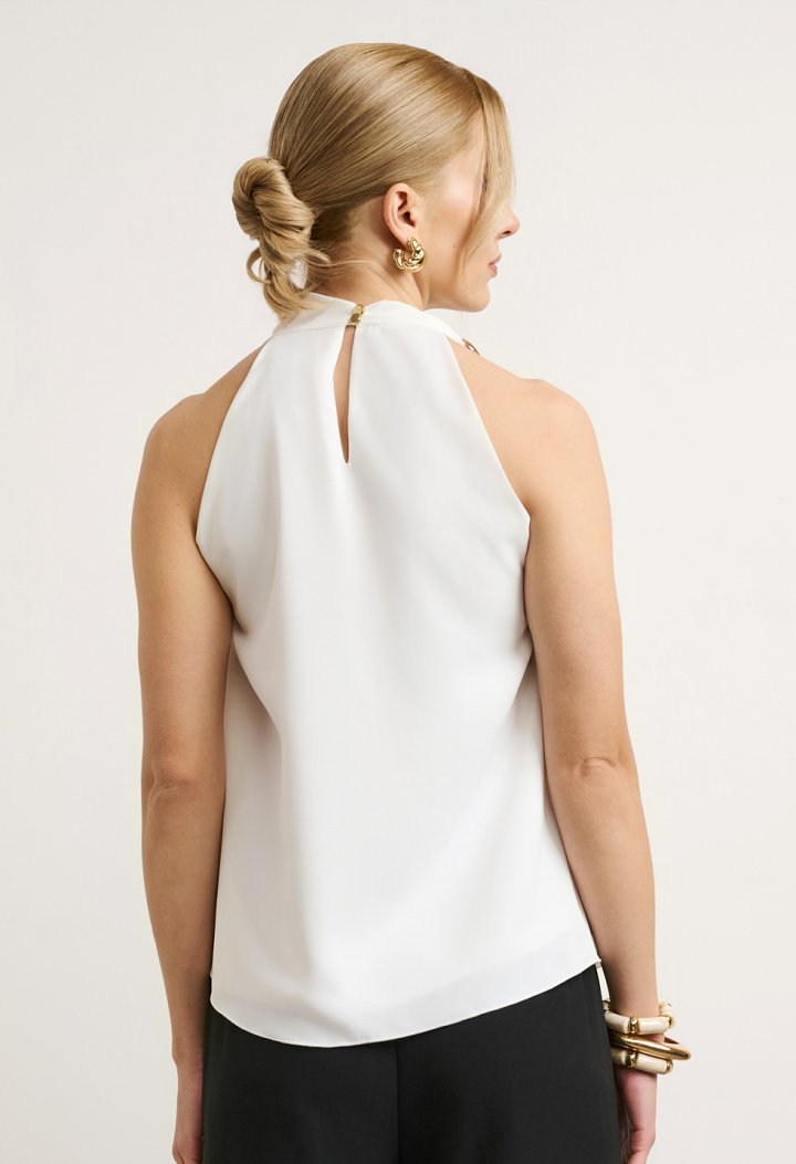 Halter blouse with decorative ring
