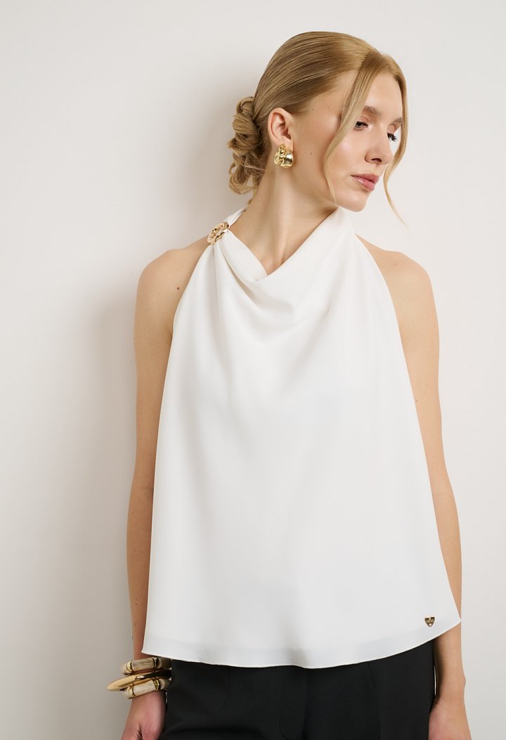 Halter blouse with decorative ring